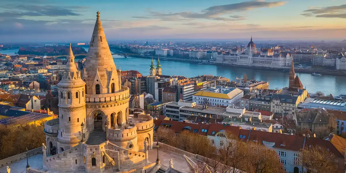 Aerial view of Fisherman's Bastion and Budapest landmarks along the Danube River